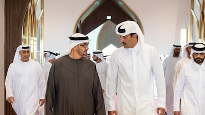 Sheikh Mohamed is greeted by Sheikh Tamim at Hamad International Airport in Doha