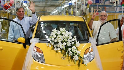 Mr Tata and Gujarat's chief minister Narendra Modi, now India's Prime Minister, at a Tata Nano factory in Gujarat in 2010. Reuters