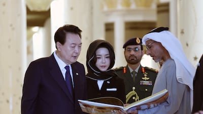 South Korean President Yoon Suk Yeol (L) and first lady Kim Keon Hee (2-L) tour the Sheikh Zayed Grand Mosque in Abu Dhabi , United Arab Emirates, 15 January 2023. EPA / YONHAP SOUTH KOREA OUT