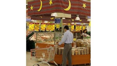 Moons and stars on traditional style fabric for Ramadan seen in Carrefour supermarket in Marina Mall.