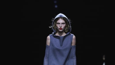 Khaite played with volume, such as this draped dress with a hood. Photo: Khaite