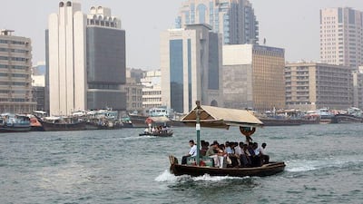 An abra ferries passengers back and forth across Dubai Creek. The ride costs just 50 fils per person.