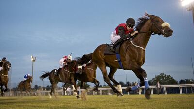 Oisin Murphy eases It’s Far From Over to victory in the Group 1 Emirates Championship at Abu Dhabi on Sunday night. Andrew Watkins for The National