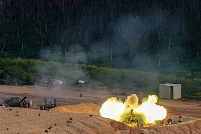 An Israeli artillery unit fires towards Lebanon on Saturday amid escalating hostilities between Israel and Hezbollah. Reuters