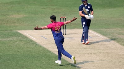 UAE's Junaid Siddique after taking the wicket of Andries Gous