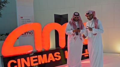Saudi men poses for a photograph at an invitation-only screening of Black Panther at the King Abdullah Financial District Theatre, in Riyadh. Fayez Nureldine / AFP Photo