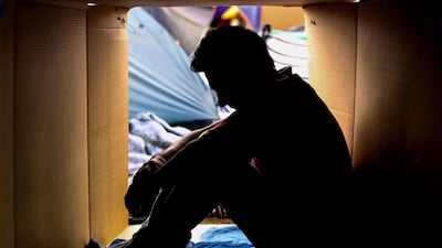 A member of the Central American migrant caravan rests at a shelter in the city of Tijuana, Baja California, Mexico. EPA