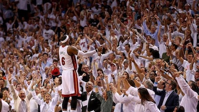 leBron James reacts to the crowd after the Miami Heat win Game 5 against the Brooklyn Nets on Wednesday to advance to the Eastern Conference finals. Mike Ehrmann / Getty Images / AFP / May 14, 2014