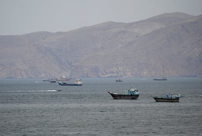 Ships and boats in the Strait of Hormuz, where US and Iranian blockades have broadened the war's impact well beyond the Middle East. Reuters
