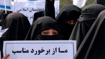 Women march to show support for the Taliban in a rally outside the Shaheed Rabbani Education University in Kabul. EPA
