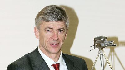 Arsenal Manager Arsene Wenger with the Manager of the Year Award during the BBC Sports Personality of the Year Award on December 12, 2004. Getty