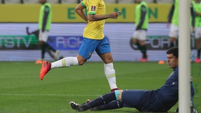 Roberto Firmino of Brazil celebrates the third goal. Getty
