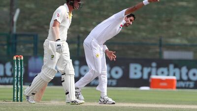 Pakistan cricketer Mohammad Abbas, right, bowls during day four of the second Test match. AFP