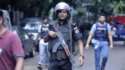 A member of the Rapid Action Batallion in the street close to the Holey Artisan Bakery in Dhaka, Bangladesh. EPA