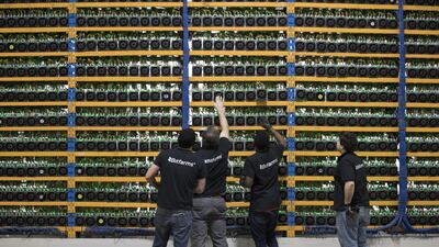 Digital currencies are a revolutionary tool that central banks should consider, but they remain far too risky to be used as legal tender any time soon, Bank for International Settlements says in a report. Christinne Muschi / Bloomberg