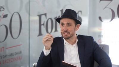 Randall Lane, chief content officer of Forbes, moderating at the summit.