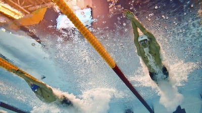 Sun Yang of China, right, and James Guy of Britain swim during the men's 400m freestyle final at the World Aquatics Championships on Sunday. Michael Dalder / Reuters