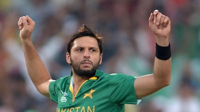 Pakistan's captain Shahid Afridi celebrates after the dismissal of Bangladesh's batsman Sabbir Rahman during the World T20 cricket tournament match between Pakistan and Bangladesh at The Eden Gardens Cricket Stadium in Kolkata on March 16, 2016. Dibyangshu Sarkar / AFP