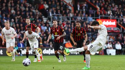 Manchester United's Bruno Fernandes scores their second goal from the penalty spot. Action Images
