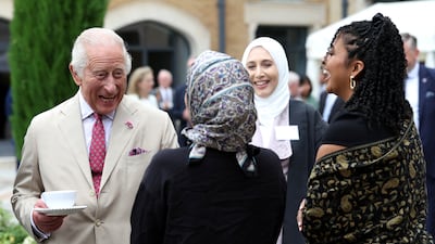 Britain's King Charles III meets staff on a visit to the Oxford Centre for Islamic Studies. Reuters