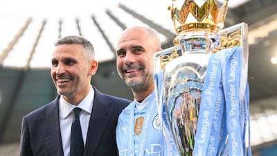 Manchester City chairman Khaldoon Al Mubarak, left, said trust formed the bedrock of his successful relationship with manager Pep Guardiola. Getty Images