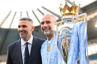 Manchester City chairman Khaldoon Al Mubarak, left, said trust formed the bedrock of his successful relationship with manager Pep Guardiola. Getty Images