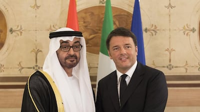 Sheikh Mohammed bin Zayed, Crown Prince of Abu Dhabi and Deputy Supreme Commander of the Armed Forces, left, and Matteo Renzi, Prime Minister of Italy, right, stand for a photograph prior to a meeting at Museo di Palazzo Vecchio. Ryan Carter / Crown Prince Court - Abu Dhabi