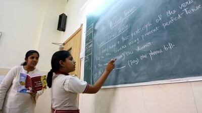 Many Indian expatriates prefer schools that teach their country's curriculum. Satish Kumar / The National