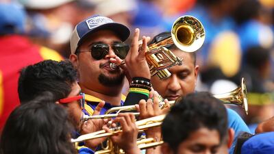 Sri Lankan fans play the trumpets during the 2015 ICC Cricket World Cup match between Australia and Sri Lanka at the Sydney Cricket Ground on March 8, 2015 in Australia. Getty Images