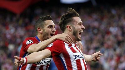 Saul Niguez of Atletico Madrid celebrates his goal against Bayern Munich in the Champions league with teammate Koke on Wednesday night. Juan Carlos Hidalgo / EPA / April 27, 2016