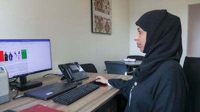 Ms Al Menhali at one of the largest Covid-19 screening sites at a workers’ camp on Reem Island. Khushnum Bhandari / The National