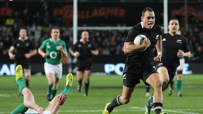 Israel Dagg of New Zealand runs in for a try against Ireland in a Test match in 2012. Sandra Mu / Getty Images