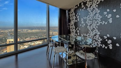 The dining room view of three-bedroom apartment in the Burj Khalifa. Courtesy Better Homes