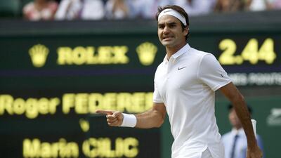 Switzerland's Roger Federer celebrates winning the fourth set in his match against Croatia's Marin Cilic on Wednesday. Paul Childs / Reuters / July 6, 2016