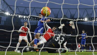 Diego Costa scores Chelsea’s goal, the eventual winner in a 1-0 victory over Arsenal on Sunday night. Dylan Martinez / Reuters