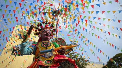 A therukoothu artist, schooled in an ancient Tamil style of folk theatre, performs at the 'Veedhi Virudhu Vizha' festival, showcasing traditional Indian art forms, in Chennai. AFP