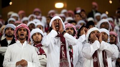 Al Wahda supporters, above, cheer on their players, but they ended up on the losing side against a powerful Al Jazira.
