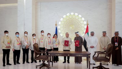 Dr Thani Al Zeyoudi, UAE Minister for Foreign Trade and Ramon Lopez, Philippines Trade and Industry Secretary, at a signing ceremony for the commencement of trade talks between the nations. Photo: Philippines pavilion at Expo 2020 Dubai