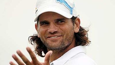 Johan Edfors, the pace-setting Swede, gestures during the first round of the Volvo Golf Champions yesterday.