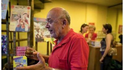 Cesar Nammour mingles at a book launch in his Beirut-based store, Recto Verso.