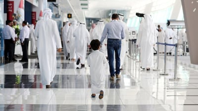Emiratis arrive at Adnec to cast their ballots in this year's FNC election. Chris Whiteoak / The National