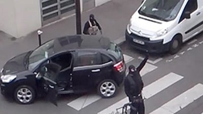 Cherif and Said Kouachi as they return to their car after the attack on the offices of French satirical weekly newspaper Charlie Hebdo in Paris on January 7. Reuters