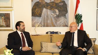 A photo distributed by the official Lebanese photography agency shows prime minister-designate Saad Hariri meeting with former prime minister Tammam Salam as discussions begin on the formation of the next cabinet, May 28, 2018. (Dalati Nohra / EPA)