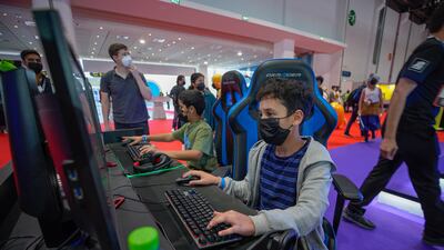 Young visitors playing computer games.