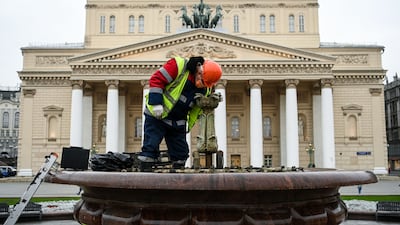 A municipal worker outside the Bolshoi Theatre in Moscow. Performances were cancelled after the fatal accident. Photo: AFP