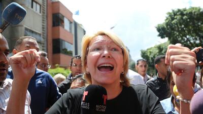 Venezuela's chief prosecutor Luisa Ortega Diaz speaks to the media outside her office after she was prevented from entering by security forces who surrounded the building in Caracas on August 5, 2017. Wil Riera / AP Photo