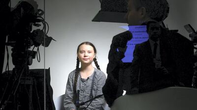 Swedish youth climate activist Greta Thunberg smiles during a TV interview at the World Economic Forum (WEF) annual meeting, on January 25, 2019 in Davos, eastern Switzerland. AFP