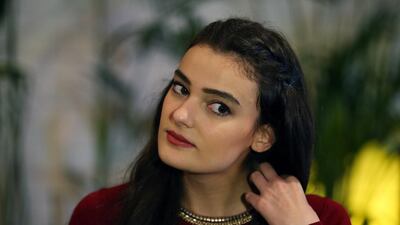 A file photo of the former Miss Turkey Merve Buyuksarac who received a suspended 14-month jail sentence for insulting president Recep Tayyip Erdogan on social media. Emrah Gurel/AP Photo