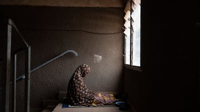 A woman prays during Friday prayer at the Great Mosque in Ouagadougou, Burkina Faso. AFP