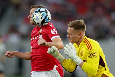 Paul Mullin of Wrexham collides with Manchester United goalkeeper Nathan Bishop during the first half of a pre-season friendly match at Snapdragon Stadium on July 25, 2023 in San Diego, California. AFP